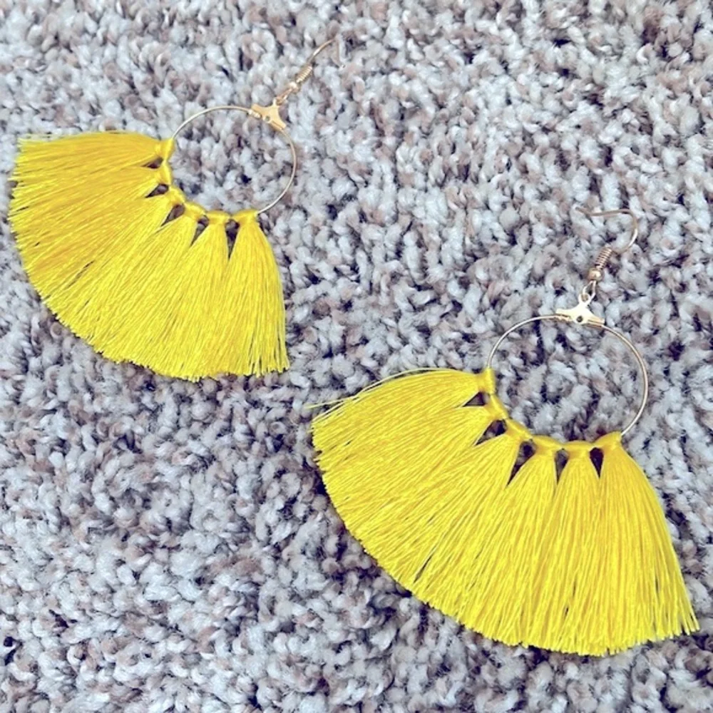 Yellow tassel fan hoops